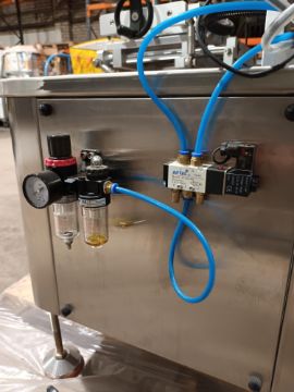 Advanced Dynamics Bottling Line Cleaning bottle by both liquid or air