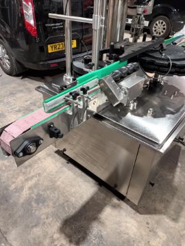 Advanced Dynamics Bottling Line Cleaning bottle by both liquid or air