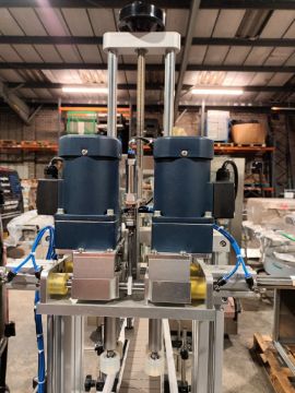 Advanced Dynamics Bottling Line Cleaning bottle by both liquid or air