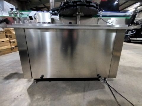 Advanced Dynamics Bottling Line Cleaning bottle by both liquid or air