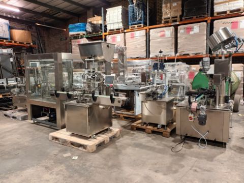 Advanced Dynamics Bottling Line Cleaning bottle by both liquid or air