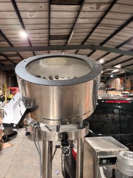 Advanced Dynamics Bottling Line Cleaning bottle by both liquid or air