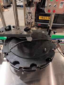 Advanced Dynamics Bottling Line Cleaning bottle by both liquid or air