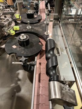 Advanced Dynamics Bottling Line Cleaning bottle by both liquid or air