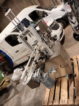 Advanced Dynamics Bottling Line Cleaning bottle by both liquid or air